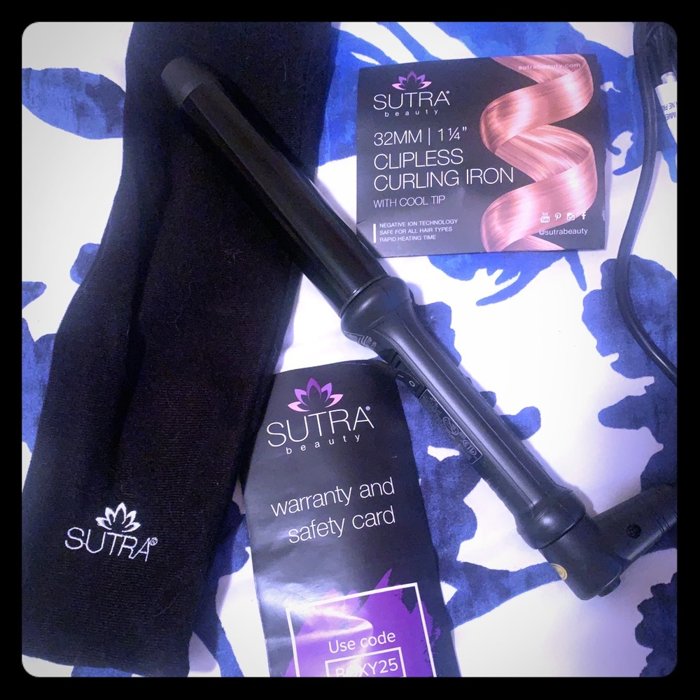 Sutra clipless curling iron with cool tip.